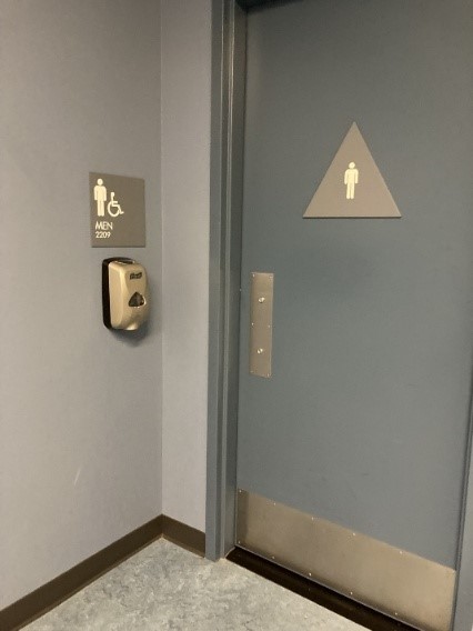 人型を三角で囲んだ男性マーク